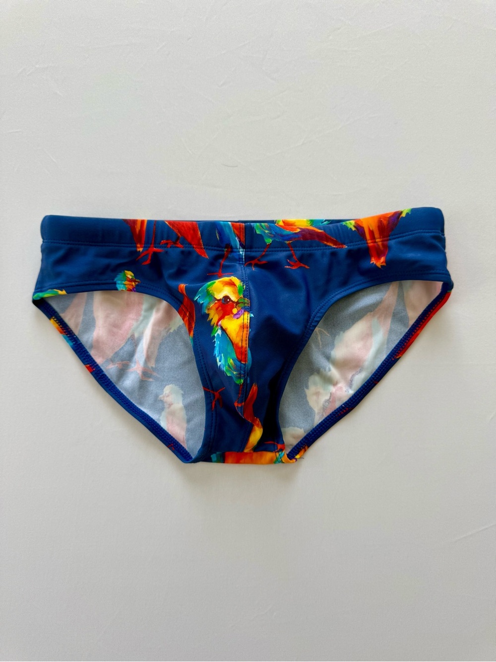 Men's Navy Swim Briefs with Colorful Parrot Print